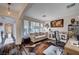 Well-lit office space with a comfortable couch and stylish decor, perfect for working from home at 167 Thunder Plains Way, Henderson, NV 89012
