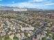 An aerial view of a neighborhood featuring the home at 1717 Double Arch Ct, with mountain views at 1717 Double Arch Ct, Las Vegas, NV 89128