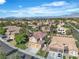An aerial view of the community showing the home's location with mountain views at 1717 Double Arch Ct, Las Vegas, NV 89128