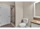 Bathroom featuring a toilet, vanity, and walk-in shower at 1717 Double Arch Ct, Las Vegas, NV 89128
