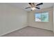 Comfortable bedroom with neutral carpet and a bright window view at 1717 Double Arch Ct, Las Vegas, NV 89128