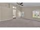This spacious bonus room is illuminated by natural light, carpeted floors, and access to the bath at 1717 Double Arch Ct, Las Vegas, NV 89128