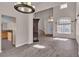 Open dining and living area with tile flooring at 1717 Double Arch Ct, Las Vegas, NV 89128