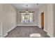 Dining area featuring wood-look tile flooring and a view of the backyard at 1717 Double Arch Ct, Las Vegas, NV 89128