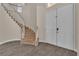 Foyer with a winding staircase and tile flooring at 1717 Double Arch Ct, Las Vegas, NV 89128