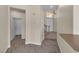 Hallway featuring modern flooring leading to various rooms at 1717 Double Arch Ct, Las Vegas, NV 89128