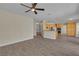 An open-concept living space, featuring tile floors, and access to the kitchen at 1717 Double Arch Ct, Las Vegas, NV 89128
