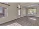 The open living space has tile floors and modern windows at 1717 Double Arch Ct, Las Vegas, NV 89128