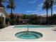 Community pool, and spa with ample seating, perfect for relaxation at 1881 W Alexander Rd # 1128, North Las Vegas, NV 89032