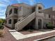 Multi-story building with stairs leading to upper units offers a great sense of community at 1881 W Alexander Rd # 1128, North Las Vegas, NV 89032