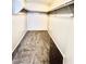Spacious carpeted walk-in closet offering ample storage with built-in shelving at 1881 W Alexander Rd # 1128, North Las Vegas, NV 89032