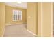 Bedroom featuring carpet flooring, neutral paint, and plantation shutters at 2318 Shorewood Hills Ave, Henderson, NV 89052