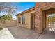 Enclosed courtyard featuring decorative stone columns, stucco walls and an iron gate at 2318 Shorewood Hills Ave, Henderson, NV 89052