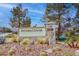 Community sign featuring lush landscaping and well-maintained grounds at 2318 Shorewood Hills Ave, Henderson, NV 89052