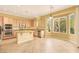 Gourmet kitchen with granite countertops, stainless steel appliances, and a breakfast nook at 2318 Shorewood Hills Ave, Henderson, NV 89052