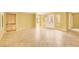 Spacious living room with tile flooring, natural light, and a built-in wet bar at 2318 Shorewood Hills Ave, Henderson, NV 89052