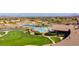 Expansive community pool and meticulously maintained green spaces offer resort-style living at 2318 Shorewood Hills Ave, Henderson, NV 89052