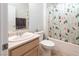 Compact bathroom featuring a sink, toilet, and shower/tub combination at 2557 Terrytown Ave, Henderson, NV 89052