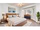 Cozy bedroom with natural light, wooden furniture, and calming decor at 2557 Terrytown Ave, Henderson, NV 89052