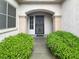 Close-up of the front entrance, showcasing the secure screen door at 2557 Terrytown Ave, Henderson, NV 89052