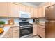 Well-equipped kitchen with stainless steel appliances and ample cabinet space at 2557 Terrytown Ave, Henderson, NV 89052