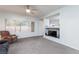 Inviting living room with large window, built-in shelving, and entertainment setup at 2557 Terrytown Ave, Henderson, NV 89052