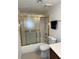 Bathroom featuring a shower with sliding glass doors and a sleek vanity at 2704 Otter Creek Ct # 101, Las Vegas, NV 89117