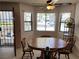Bright dining area featuring a wood table with seating for four, open to the patio at 2704 Otter Creek Ct # 101, Las Vegas, NV 89117