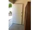 Open front door with a view of exterior, and an armoire at 2704 Otter Creek Ct # 101, Las Vegas, NV 89117