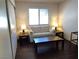 Cozy living area with a comfortable sofa, and large window at 2704 Otter Creek Ct # 101, Las Vegas, NV 89117