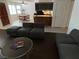 Living room with open floor plan and view of the dining area at 2704 Otter Creek Ct # 101, Las Vegas, NV 89117