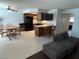 Open concept living space with eat-in kitchen, dining area, and a cozy living room with comfortable seating at 2704 Otter Creek Ct # 101, Las Vegas, NV 89117
