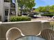 Close up of the patio with a view of the parking, trees and exterior at 2704 Otter Creek Ct # 101, Las Vegas, NV 89117