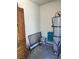 Storage area with water heater and armoire, providing ample space at 2704 Otter Creek Ct # 101, Las Vegas, NV 89117