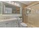 Modern bathroom showcasing a glass-enclosed shower, stylish vanity, and contemporary finishes at 3367 Cheltenham St, Las Vegas, NV 89129