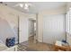 Bright bedroom featuring a decorative wall and a well-organized closet space at 3367 Cheltenham St, Las Vegas, NV 89129