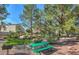 Charming community park featuring a picnic table, barbeque, and mature trees at 3367 Cheltenham St, Las Vegas, NV 89129