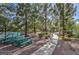 Scenic community park featuring picnic tables, walking paths, and mature trees providing ample shade at 3367 Cheltenham St, Las Vegas, NV 89129