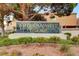 Community sign for 'American West Village' set amidst a well-maintained landscape at 3367 Cheltenham St, Las Vegas, NV 89129