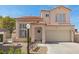 Charming two-story home featuring a two-car garage, well-maintained landscaping, and a welcoming entryway at 3367 Cheltenham St, Las Vegas, NV 89129