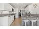 Modern kitchen with stainless steel appliances, sleek countertops, and ample cabinet space at 3367 Cheltenham St, Las Vegas, NV 89129