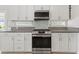 Well-equipped kitchen with stainless steel appliances, modern cabinets and ample counter space at 3367 Cheltenham St, Las Vegas, NV 89129