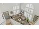 Spacious living room with sectional sofa, shutters, and stylish decor for a comfortable living space at 3367 Cheltenham St, Las Vegas, NV 89129