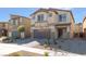 Charming two-story home features a well-maintained exterior and an attached two-car garage at 3815 Corellia Ave, North Las Vegas, NV 89084