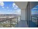Balcony featuring an open city view, and clear glass railings at 4381 W Flamingo Rd # 3120, Las Vegas, NV 89103