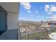 A view from the balcony overlooking a vibrant cityscape at 4381 W Flamingo Rd # 3120, Las Vegas, NV 89103