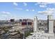 Panoramic city view featuring the Palms Casino Resort under a bright, partly cloudy sky in Las Vegas at 4381 W Flamingo Rd # 3120, Las Vegas, NV 89103