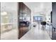 Spacious interior showcasing the seamless flow of the open-concept design, including the bathroom, kitchen, and bedroom at 4381 W Flamingo Rd # 3120, Las Vegas, NV 89103