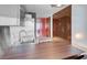Modern kitchen features stainless steel countertops, a built-in microwave, and a small seating area at 4381 W Flamingo Rd # 3120, Las Vegas, NV 89103