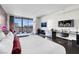 Bright and airy living room with a wall-mounted TV and city views at 4381 W Flamingo Rd # 3120, Las Vegas, NV 89103